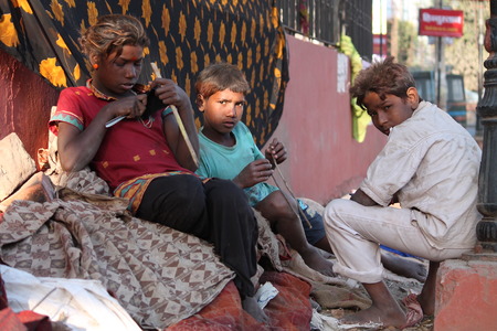 Indian poor. Street photo. Shot at Gandhi Maidan, Patna, India at afternoon hours on 11.03.15.のeditorial素材