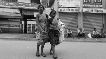 Indian girl ragpickers. Shot at Bhattacharya rd. on 17.07.15 at morninghours.のeditorial素材