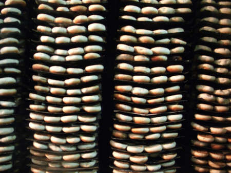Bread stacked in a bakery.