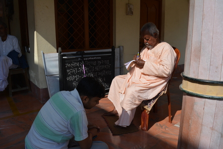 Gaudia temple, Swaroop ganj, Mayapur, Nabadwip, India. ISKCON temple and local activities. Shot on morning, December 28, 2017.  International Society for Krishna Consciousness activities and Mayapur, Nadia District. River Hoogly and Jalangi. Rural religioのeditorial素材
