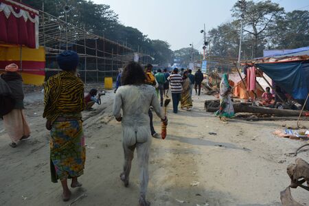 Kolkata, India. 08th January 2018. Naga Sadhus, devotees and rituals at Ganga Sagar Shivir, Outram Ghat transit camp for Ganga Sagar Mela 2018.のeditorial素材