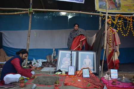 Kolkata, India. 08th January 2018. Naga Sadhus, devotees and rituals at Ganga Sagar Shivir, Outram Ghat transit camp for Ganga Sagar Mela 2018.のeditorial素材