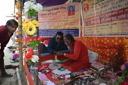 Kolkata, India. 08th January 2018. Naga Sadhus, devotees and rituals at Ganga Sagar Shivir, Outram Ghat transit camp for Ganga Sagar Mela 2018.のeditorial素材
