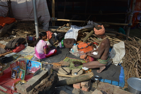 Kolkata, India. 08th January 2018. Naga Sadhus, devotees and rituals at Ganga Sagar Shivir, Outram Ghat transit camp for Ganga Sagar Mela 2018.のeditorial素材