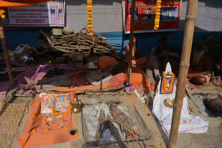 Kolkata, India. 08th January 2018. Naga Sadhus, devotees and rituals at Ganga Sagar Shivir, Outram Ghat transit camp for Ganga Sagar Mela 2018.のeditorial素材