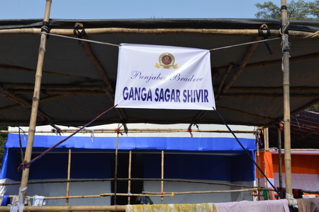 Kolkata, India. 08th January 2018. Naga Sadhus, devotees and rituals at Ganga Sagar Shivir, Outram Ghat transit camp for Ganga Sagar Mela 2018.のeditorial素材