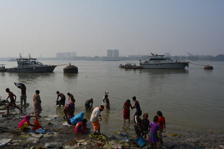 Kolkata, India. 08th January 2018. Naga Sadhus, devotees and rituals at Ganga Sagar Shivir, Outram Ghat transit camp for Ganga Sagar Mela 2018.のeditorial素材