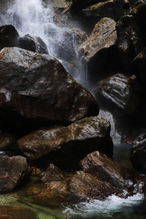 beautiful waterfalls of north sikkim,mountain stream flowing down to the foothills or valley near yumthang valley in north sikkim, north east indiaの写真素材