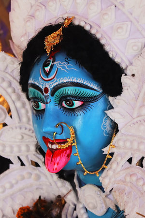 happy kali puja and diwali, idol of hindu goddess maa kali at puja pandal in west bengal, india....
