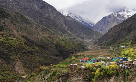 birds eye view of beautiful kyelang or keylong hillstation, surrounded by snowcapped himalaya...