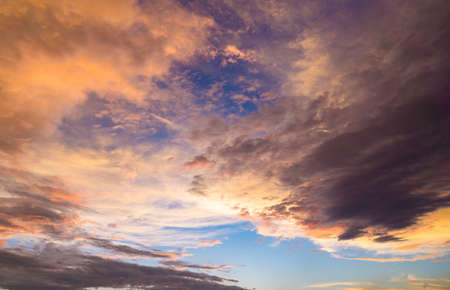 Different shapes of clouds forming at the evening golden hour on skies of Uttarakhand India.