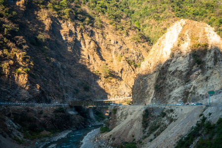 Scenic Yamuna Bridge amidst Mussoorie's valley, crossing the Yamuna River, Uttarakhand, India