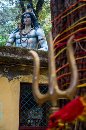 Feb.14th2024, Uttarakhand India. Sacred Lord Shiva Sculpture and Trident: Tarkeshwar Mahadev Temple,...
