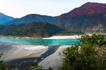 Sacred Confluence: Ganga and Nayar Rivers at Vyas Ghat, Bagi, Uttarakhand, Indiaの写真素材