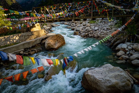 A sacred Ganges tributary, Bhagirathi River flows from Gangotri Glacier through Harsil Valley,...