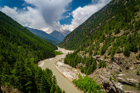 A sacred Ganges tributary, Bhagirathi River flows from Gangotri Glacier through Harsil Valley, merging at Devprayag.の写真素材
