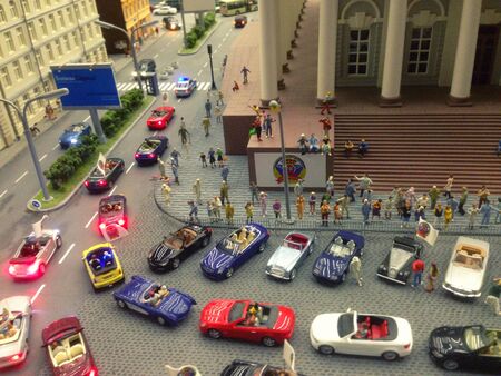 Holiday convoy of cars N1 in the toy city.の写真素材