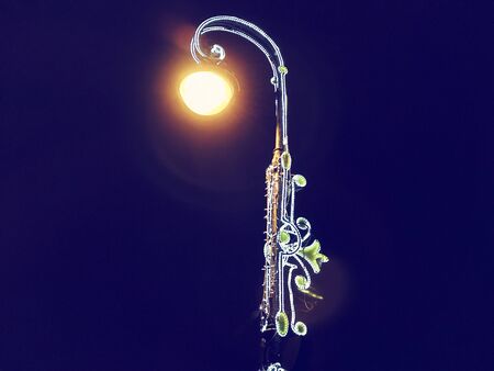 New Year's decorated lights with a blue background.の写真素材