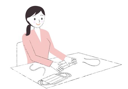 A woman who makes a mask by hand to take measures against covid-19のイラスト素材