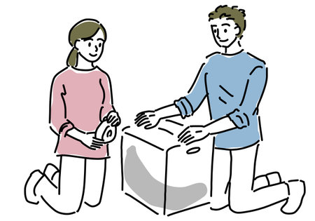 Couple packing for moving  hand drawing illustrationのイラスト素材