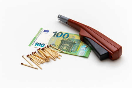 Matches, piezo-igniter are on 100 euro banknotes, a type of ignition that is used in portable camping stoves. Piezo ignition takes its name from its use of piezoelectricityの写真素材