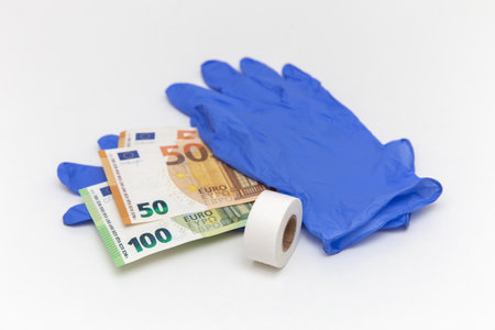 Blue latex gloves, a roll of bandage, and 50 and 100 euro bills. For the cashier or seller, sale of...