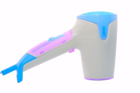 Stylish magenta and blue hairdryer on whiteの写真素材