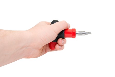 Hand with  red screwdriver isolated on a white backgroundの写真素材