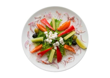 Appetizing salad  in a plate on white background.の写真素材