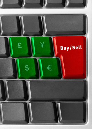 computer keyboard with  color currency buttonsの写真素材