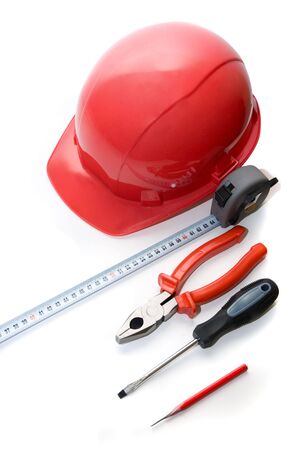  Safety helmet, measuring tape and other tools isolated on white
の写真素材