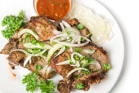 Closeup of shish kebab isolated on white backgroundの写真素材