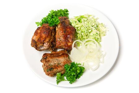 Grilled meat with vegetables isolated on white backgroundの写真素材