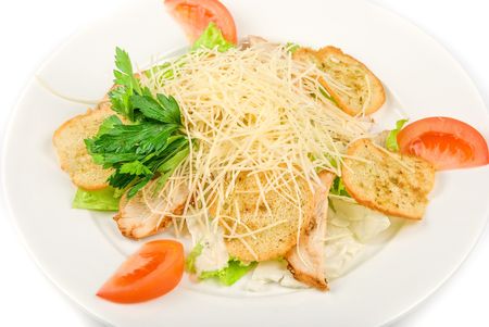 Tasty Salad  dish with dried crust, vegetables, greens and cheese on a white backgroundの写真素材