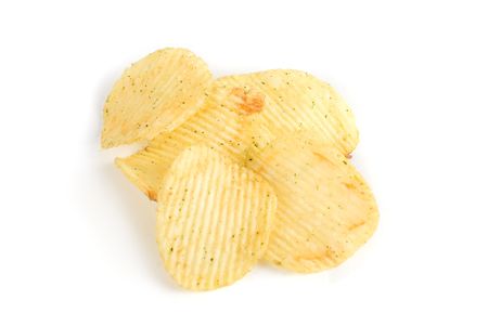 Potato chips close up isolated on a white backgroundの写真素材