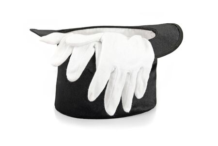Black magic hat and white gloves isolated on a white backgroundの写真素材