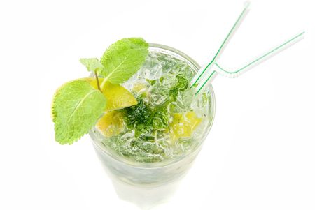 mojito alcohol fresh cocktail closeup with lemon and lime isolated on a white の写真素材