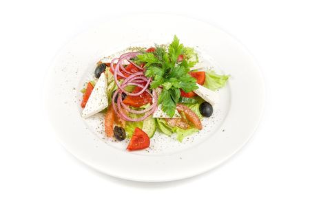 Greece salad dish close up  on a white backgroundの写真素材