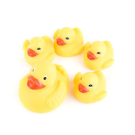 yellow ducks isolated on a white backgroundの写真素材