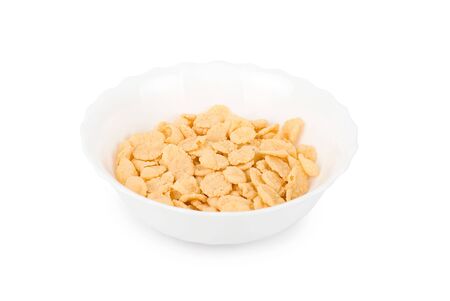 bowl of cornflakes isolated on a white backgroundの写真素材