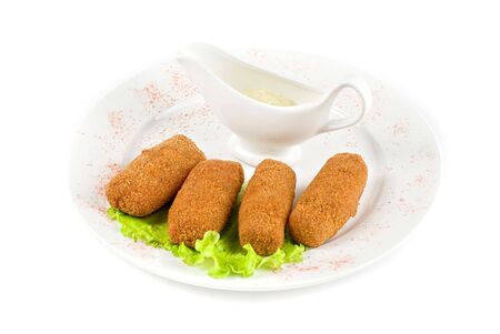 roasted cutlets of meat and lettuce isolated on a whiteの写真素材