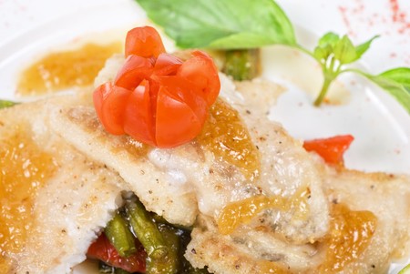 halibut filet roast at lime juice and vegetables