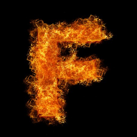Fire letter F on a black backgroundの写真素材