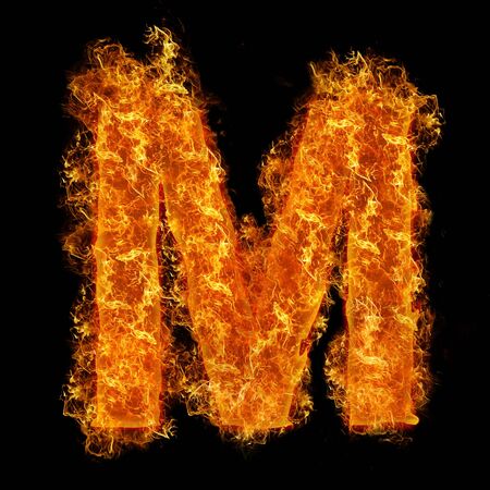 Fire letter M on a black backgroundの写真素材
