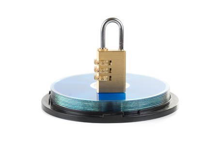 Data security concept: silver CD/DVD with combination lockの写真素材