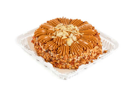 nuts cake closeup isolated on a whiteの写真素材