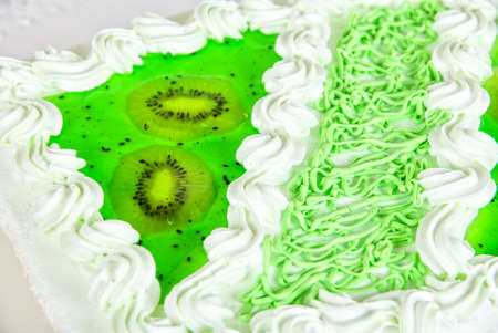 fruit kiwi cake closeup isolated on a whiteの写真素材