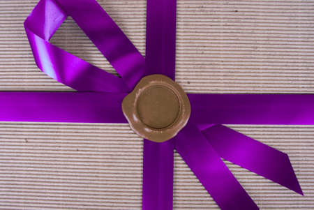 Closeup of wax seal at gift boxの写真素材