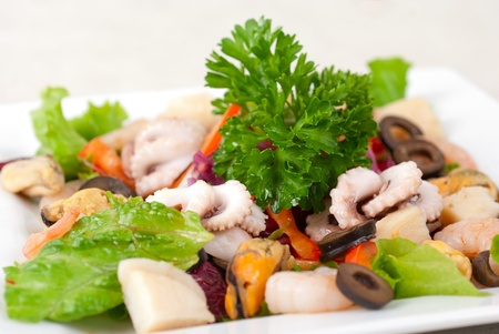 appetizer closeup of different seafood and vegetablesの写真素材