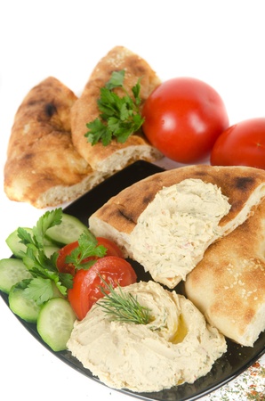 Bread with pate and fresh vegetables of tomatoes and cucumbersの写真素材